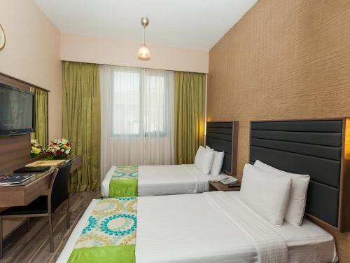Oasis Deira Hotel Dubai Exteriör bild
